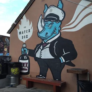 a man in a tuxedo smoking a cigarette