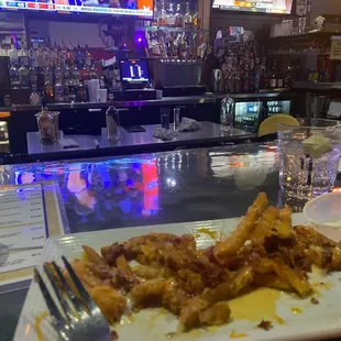 a plate of food on a bar