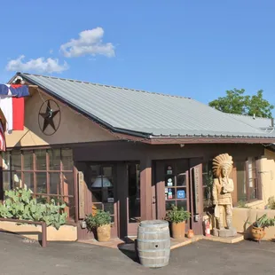 The Maverick Inn office.  And Wooden Indian guard.