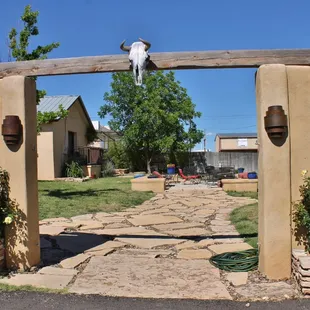 Entrance to the balcony suite and fire~pit area. Sage and many other fragrant plants are all around the hotel's grounds. Very nice!