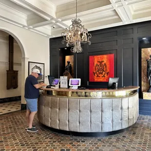 Hubby checking us in at the beautiful reception desk in the Mayo