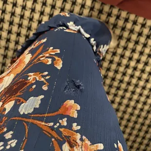 What the chaise in my room did to my dress. I didn't notice how damaged the chair was before brushing up next to it and it ruining my dress.