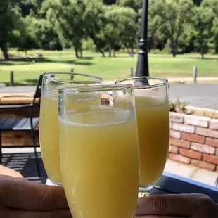 two glasses of orange juice
