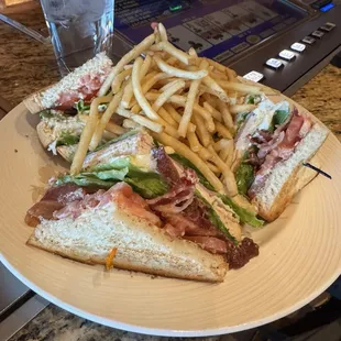 Really good club sandwich and fries fresh out of the kitchen. Don't forget to take the pick out of the sandwich before you bite.