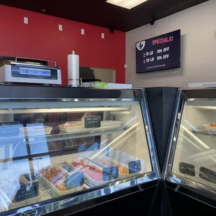 a display of meat and pastries