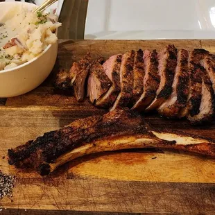 Tomahawk steak with 3 sauces addon (Serrano mushroom cream, red wine demi, &amp; chimichurri) and a side order of garlic mashed potatoes