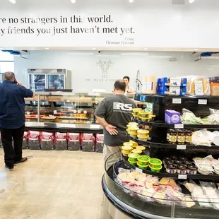 customers in the meat section