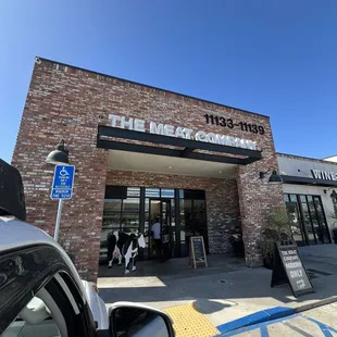 Front entrance w/ designated two 15-mins parking spots right in front.