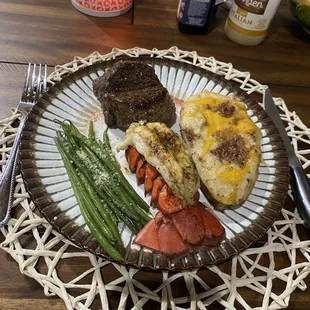 Valentine's Day special. (2 filet, 2 lobster tail, 2 baked potatoes, and 2 side salads) 60$