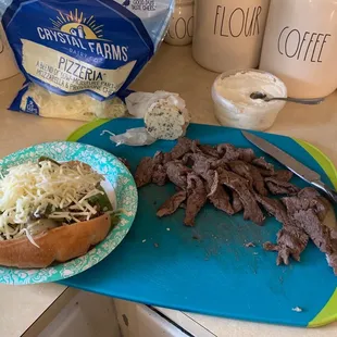 a plate of food and a knife