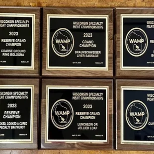five plaques for the winners