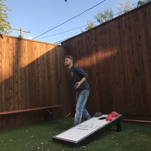 This place not only has amazing meat, but they have delicious sandwiches, amazing staff and cornhole in the back.