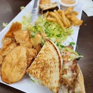 1/2 Brisket Taco (back)1/2 Muther Clucker (front)1/2 chips 1/2 fries