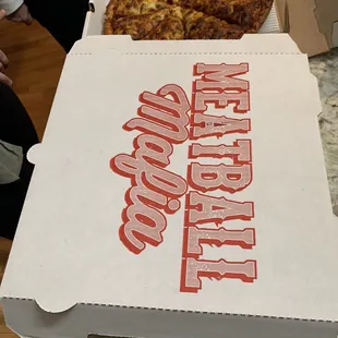 a pizza in a pizza box