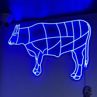 a neon cow