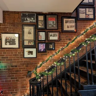 a staircase decorated for christmas