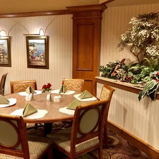 a round table with place settings