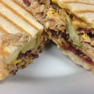 The Havana, our favorite Cuban Sandwich, boasts shoulder bacon, pork carnitas, pickles, swiss cheese and our Cajun aeoli.