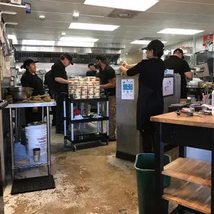 Super busy place! Lots of cooks, an assembly line and a sweet manager.