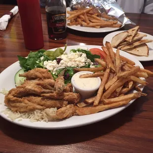 Fried smelt platter w/Greek salad, rice pilaf and hand cut fries
