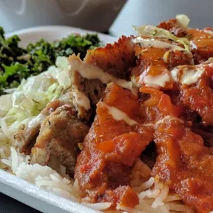 Gyro on Basmati Rice with Moroccan tomatoe and garlic sauces.