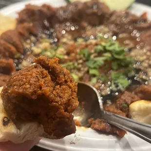 Muhummara red pepper dip, slightly spiced, deep and rich flavor