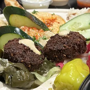 Falafel, dips, mixed veggie platter, dolma