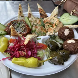 Mix plate of dips and veggie items