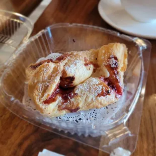 a pastry in a plastic container