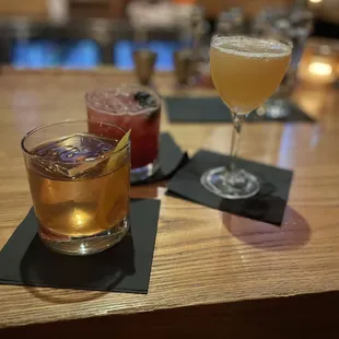 two cocktails on a table
