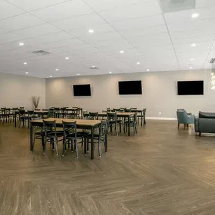 Seating area includes 9 six-foot tables, 48 chairs.