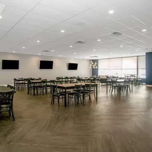 Seating area includes 9 six-foot tables, 48 chairs.