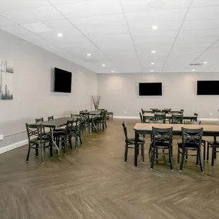 Seating area includes 9 six-foot tables, 48 chairs.