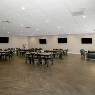 Seating area includes 9 six-foot tables, 48 chairs.