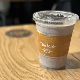 a cup of coffee on a table