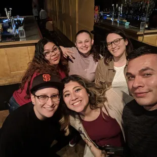 a group of people posing for a picture