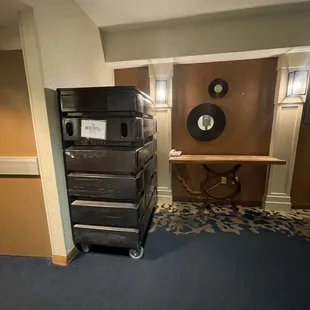 Dirty linen bin lives by elevators