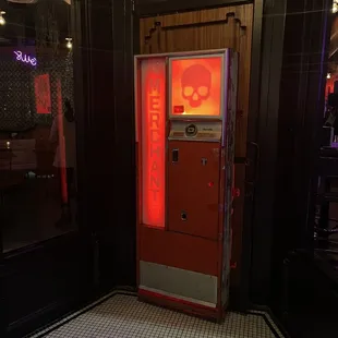 The red &quot;vending machine &quot; is the door to The Merchant