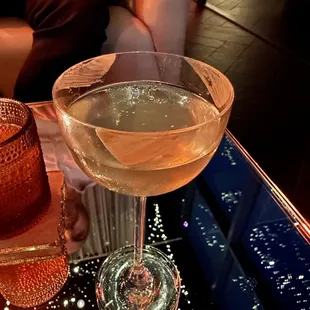Albedo: añejo tequila, amburana cachaca, pomelo, rich acacia honey, Thai chili salt, coconut cream wash
