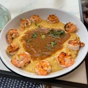 a bowl of shrimp and grits