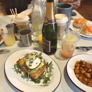 a table full of food and drinks
