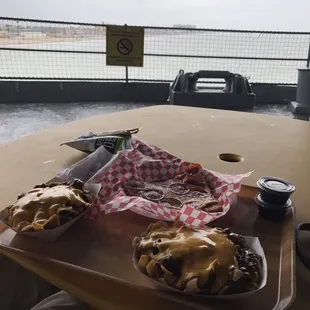 Frito pies and a pepperoni pizza