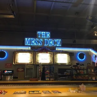 the neon sign above the counter