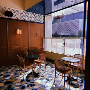 a table and chairs in a restaurant