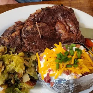 Bottomland Prime Ribeye,  brussel sprouts, loaded baked potato