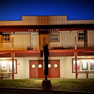 the front of a building at night