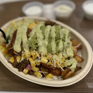 a plate of food with guacamole