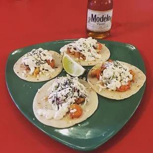 Crawfish street tacos and a modelo... Perfect lunch. Only served in season, call and check beforehand