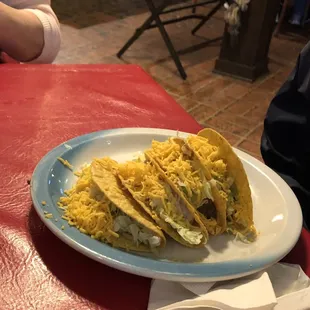 Four tacos two beef and two chicken