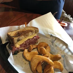 Reuben sandwich and side winder fries.